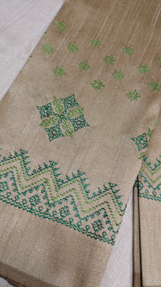 Beige kasuti blouse front view with stitched embroidery around neckline